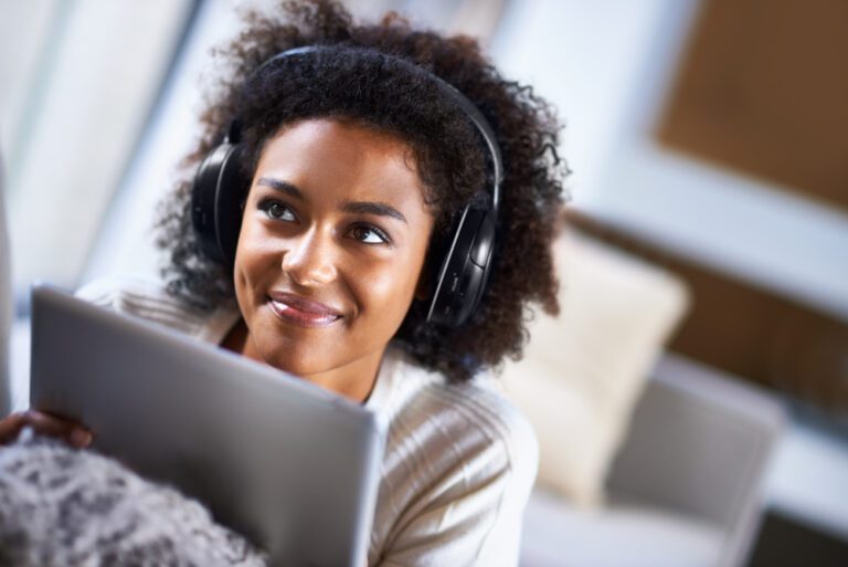 woman listening to fertility podcasts